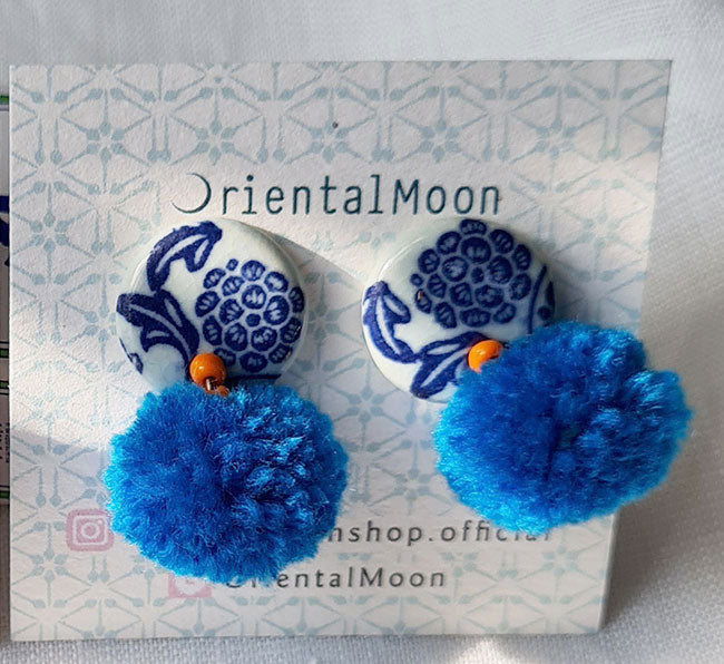 Blue & white ceramic stud earrings decorated with Pom Pom ( Pattern type)