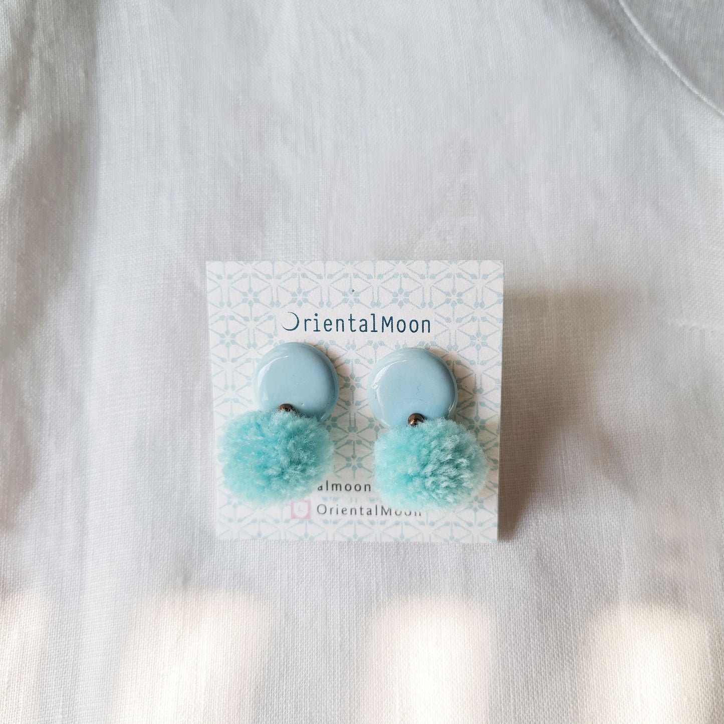 Pastel ceramic stud earrings decorated with Pom Pom ( Pattern type)