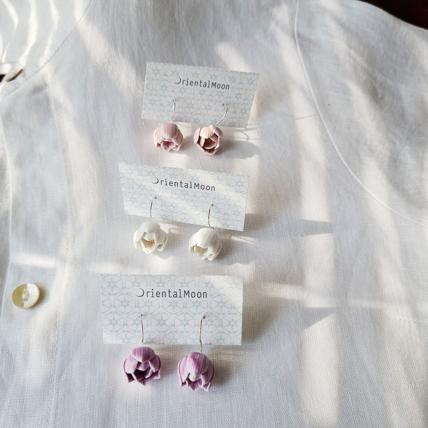 Lotus bud porcelain hanging earrings with a 925 sterling silver hook