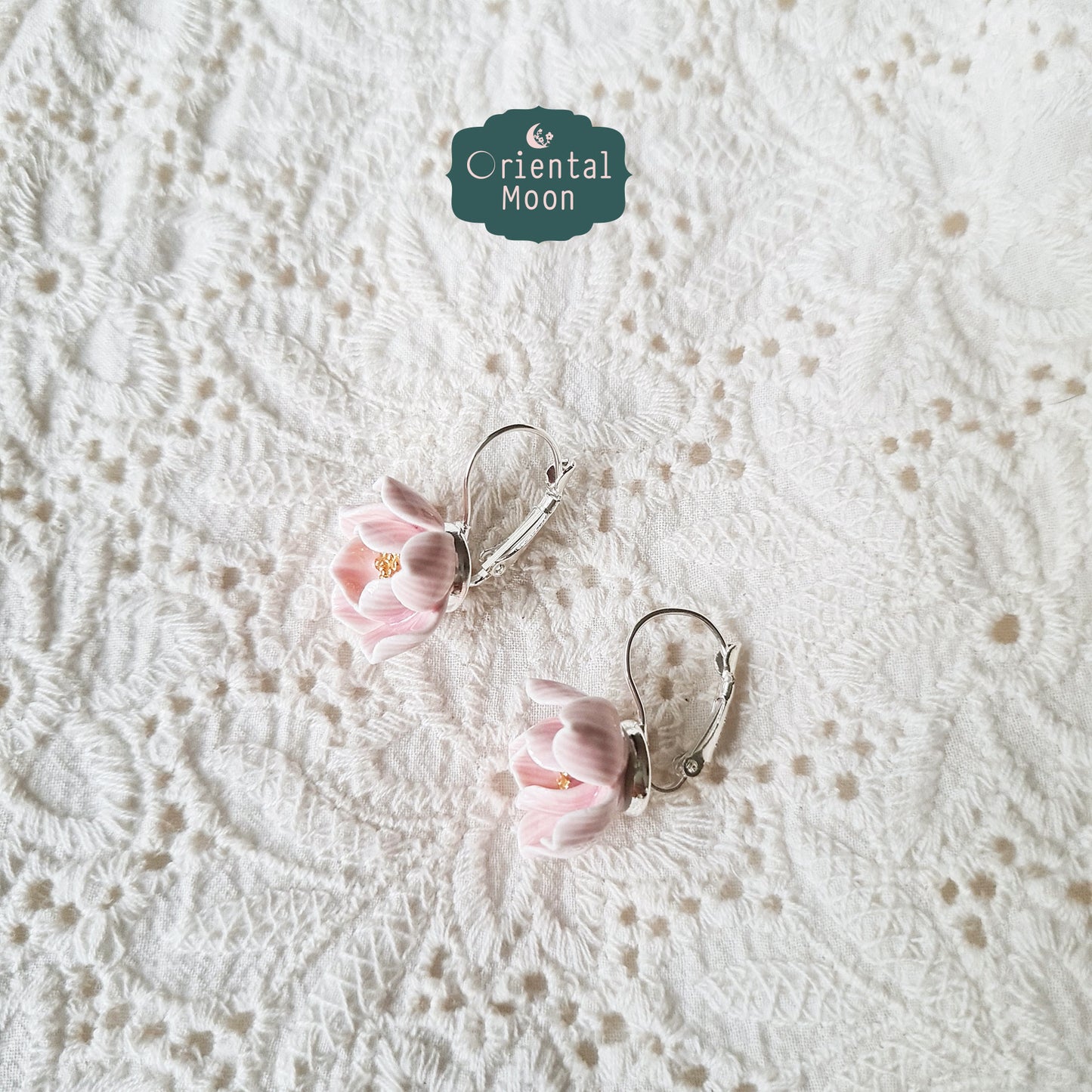 Lotus porcelain hanging earrings with a 925 sterling silver circular base