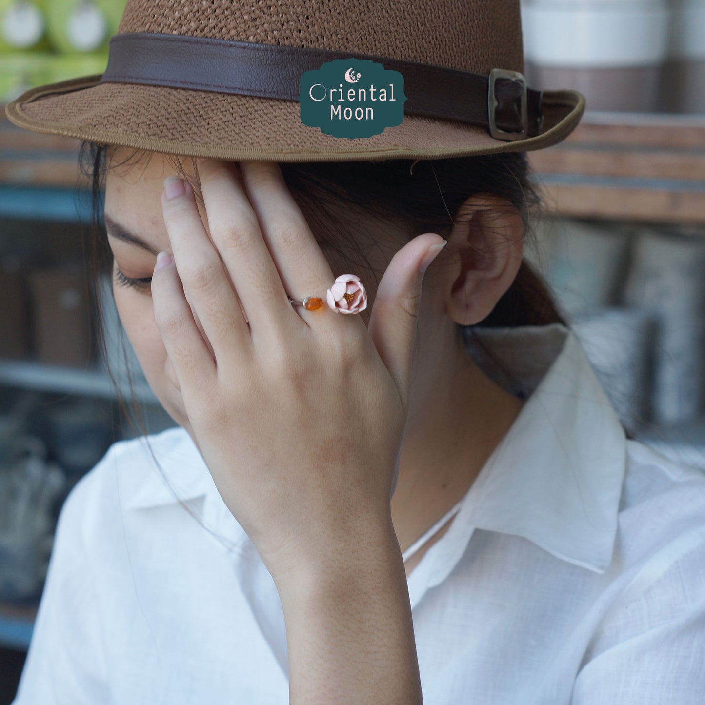 Adjustable lotus bud porcelain ring with a dice crystal bead