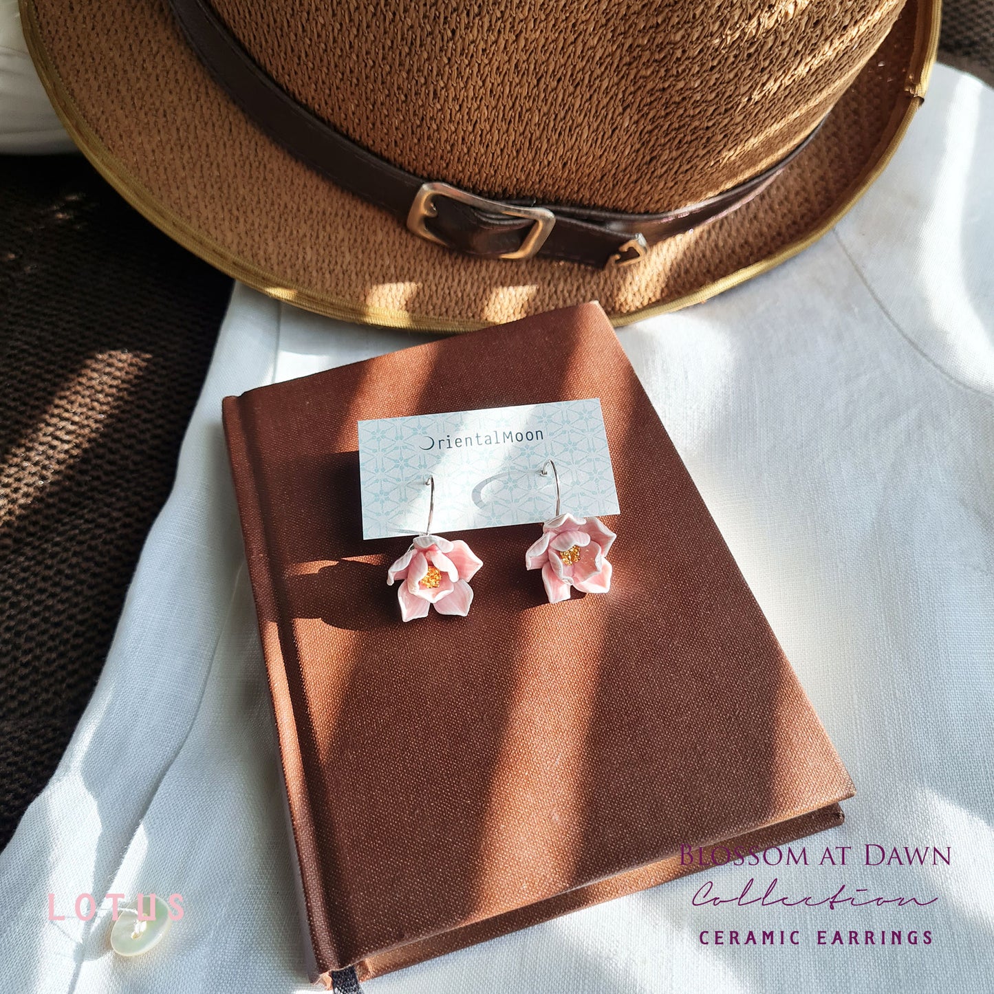 Lotus porcelain hanging earrings with a 925 sterling silver circular base