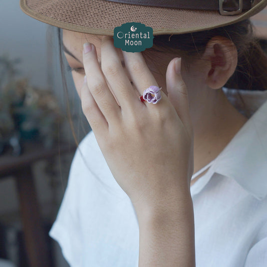 Adjustable lotus bud porcelain ring with a dice crystal bead
