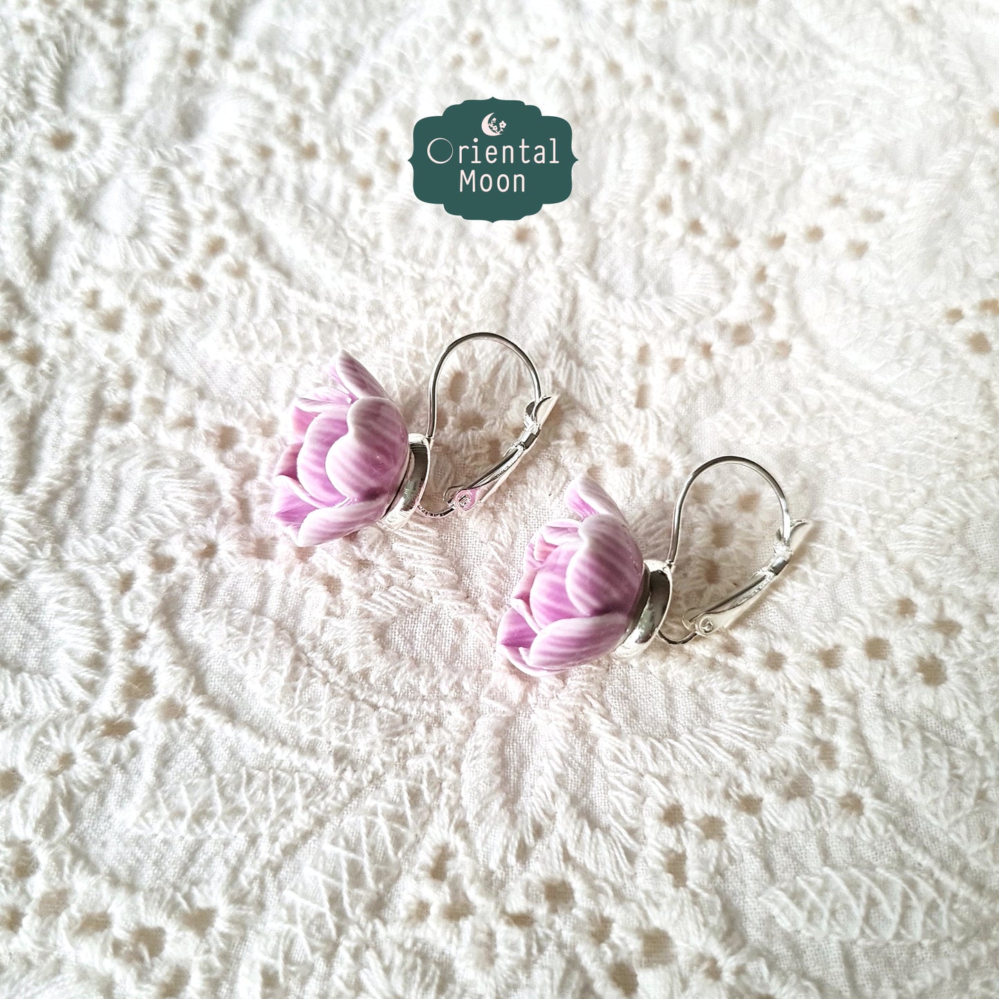 Lotus porcelain hanging earrings with a 925 sterling silver circular base