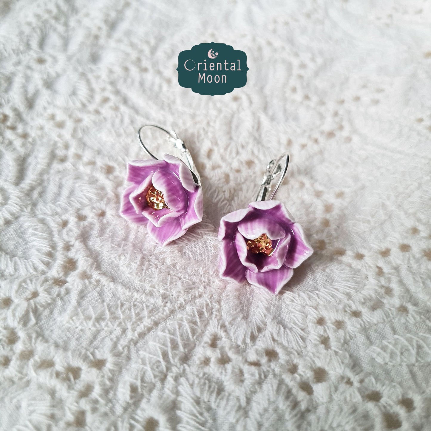 Lotus porcelain hanging earrings with a 925 sterling silver circular base