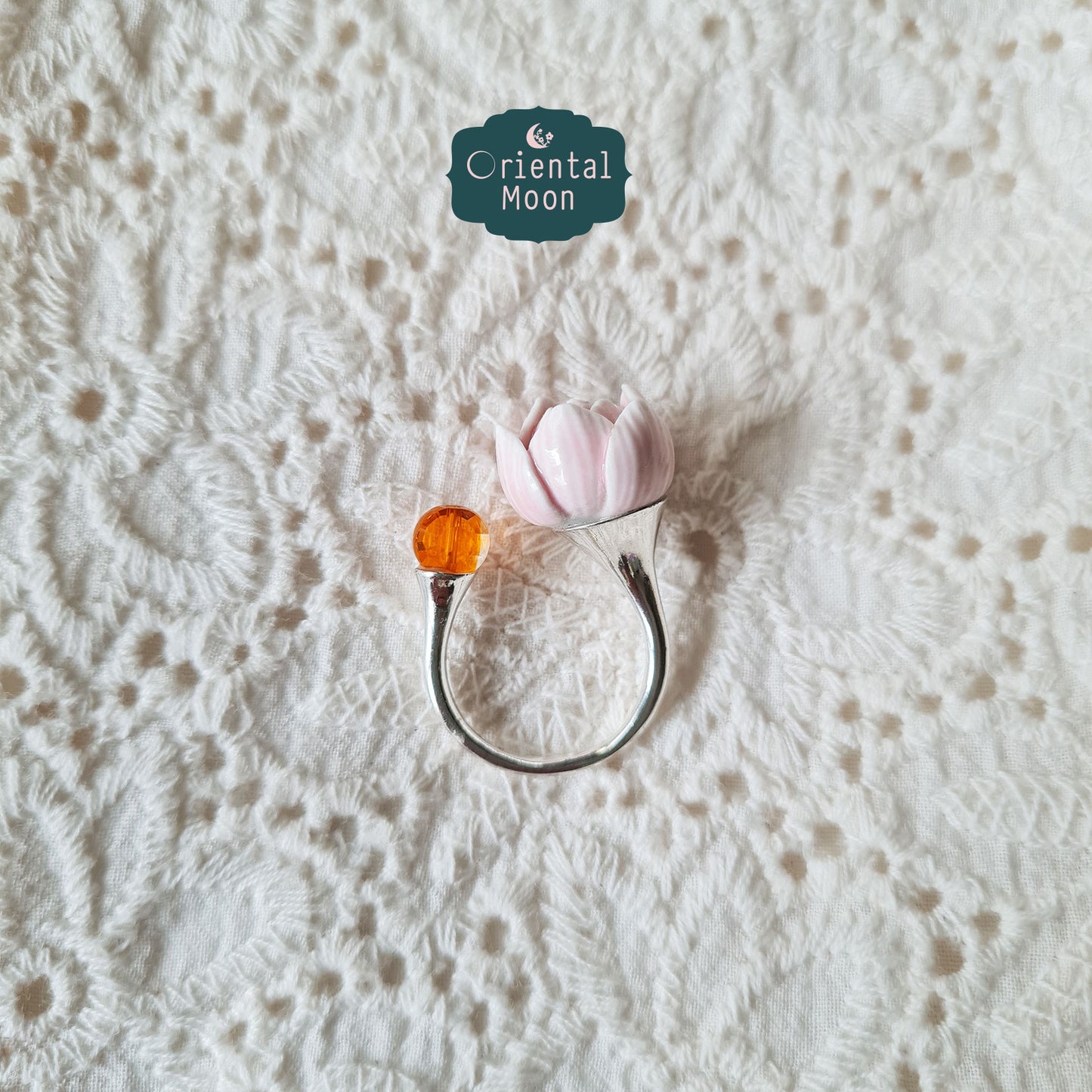 Adjustable lotus bud porcelain ring with a dice crystal bead