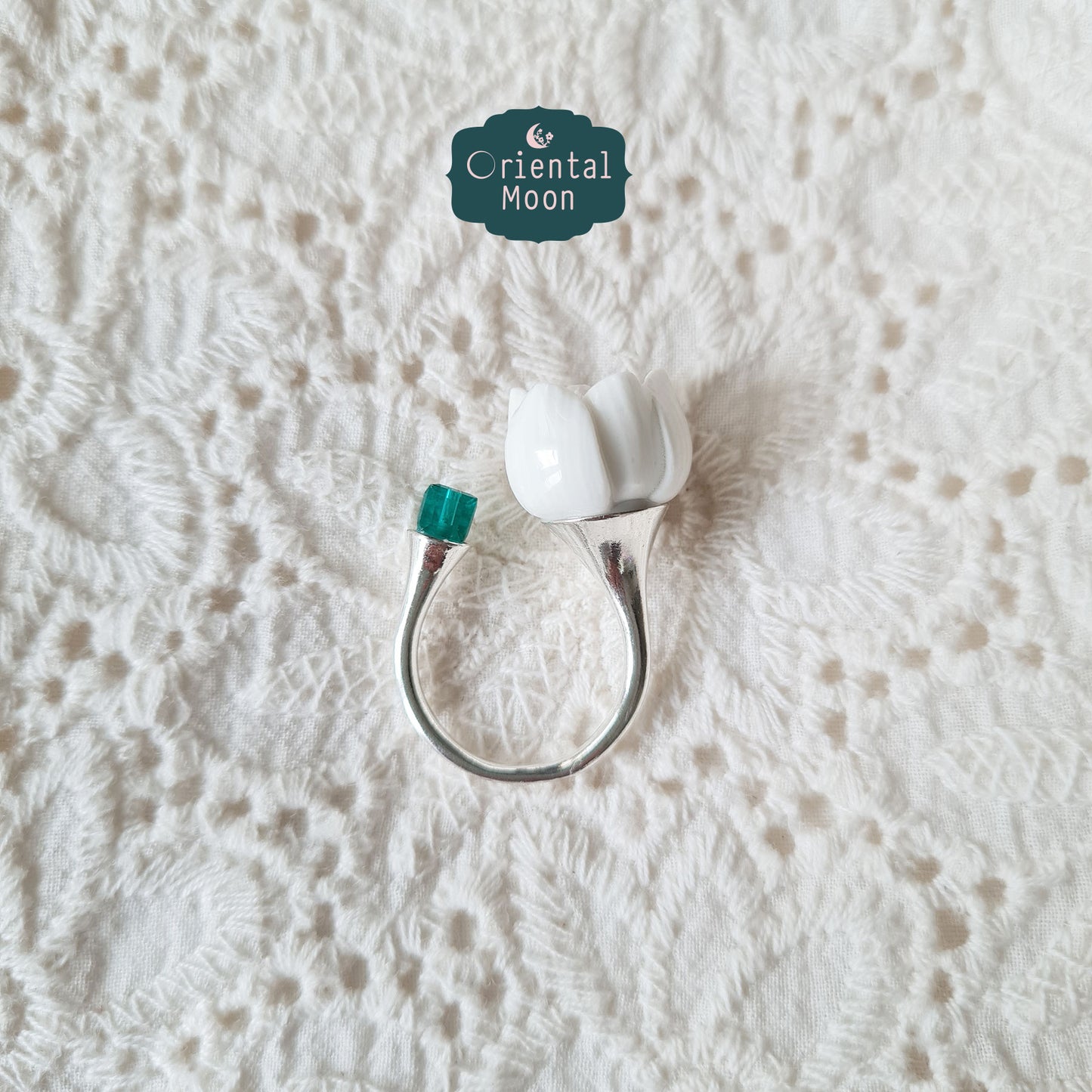 Adjustable lotus bud porcelain ring with a dice crystal bead