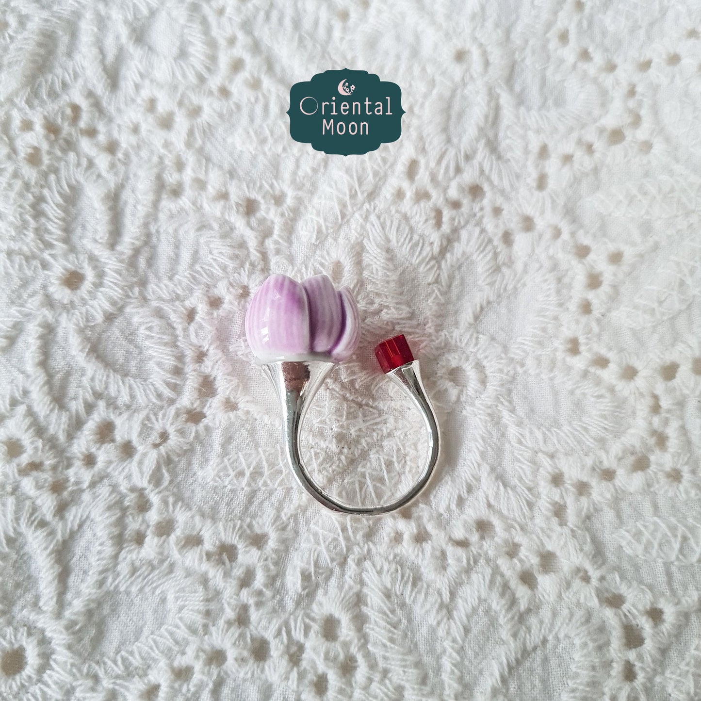 Adjustable lotus bud porcelain ring with a dice crystal bead