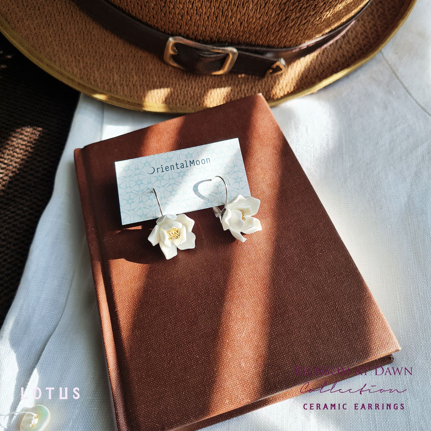 Lotus porcelain hanging earrings with a 925 sterling silver circular base