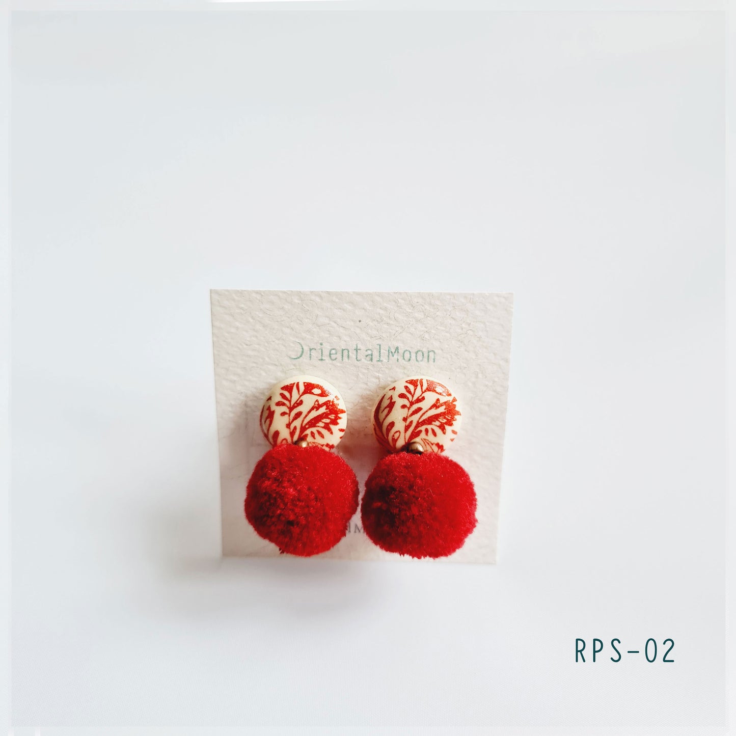 Red & white ceramic stud earrings decorated with Pom Pom ( Pattern type)
