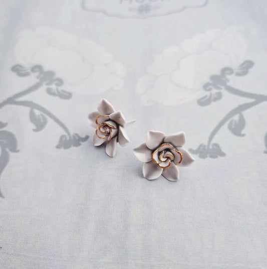Dok Pud Son Porcelain stud earrings with 925 sterling silver posts.